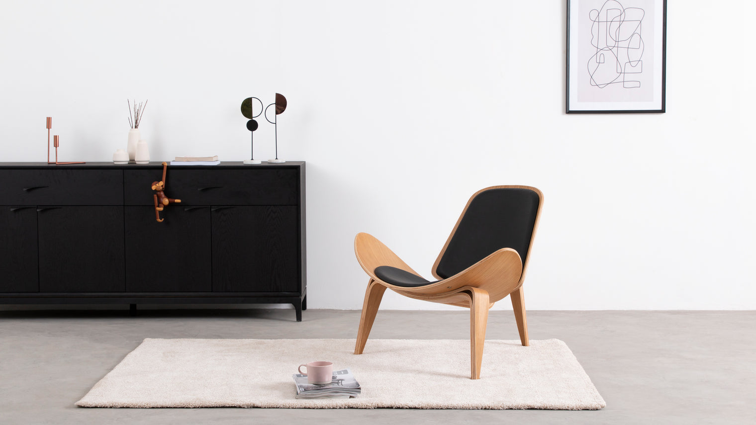 A unique design ahead of its time|The Shell Lounge Chair combines contemporary elements with a futuristic aesthetic. A trio of sleek, hardwearing legs serve as a base for the seemingly weightless, curved seat.
